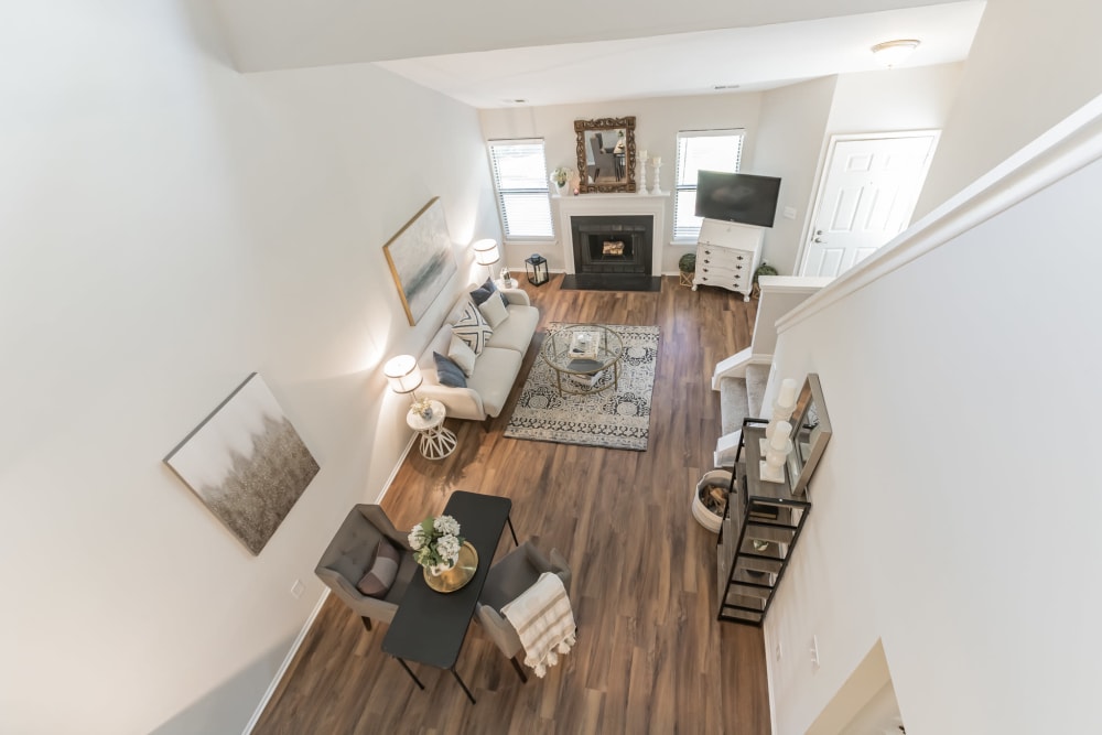 Overlooking living room area from second story landing at Eagle Rock Apartments at Columbia in Columbia, Maryland