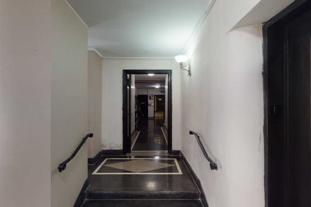 Spacious lobby area where residents enter the building at Eastgold NYC in New York, New York