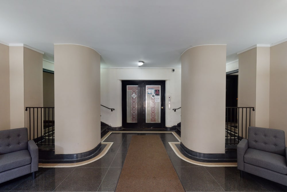 Spacious lobby area where residents walk through each day at Eastgold NYC in New York, New York