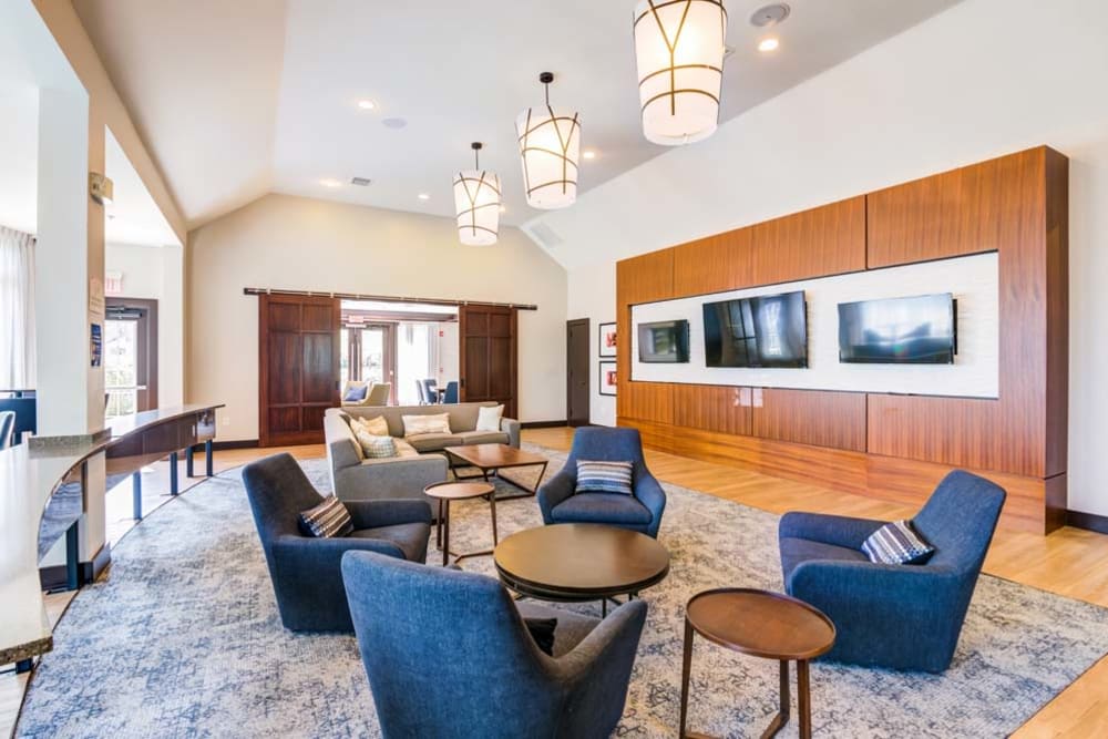 Community space and sitting area inside spacious clubhouse at The Grove Somerset in Somerset, New Jersey