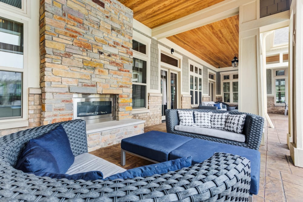 Outdoor lounge by pool at The Oaks Of Vernon Hills in Vernon Hills, IL