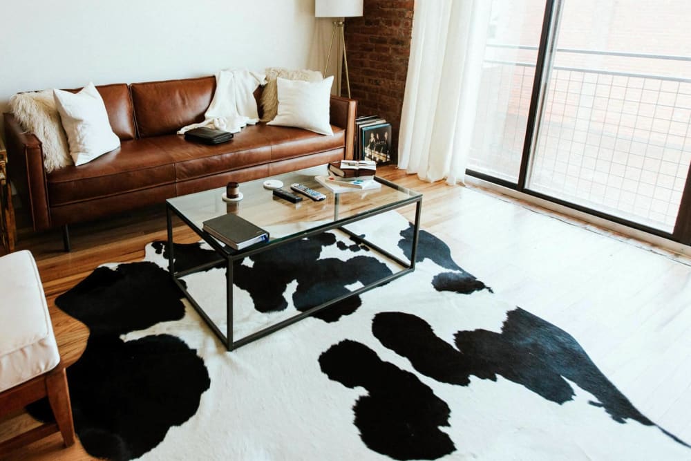 Cow colored throw rug at The Gates at Meadow Place in Willow Park, Texas