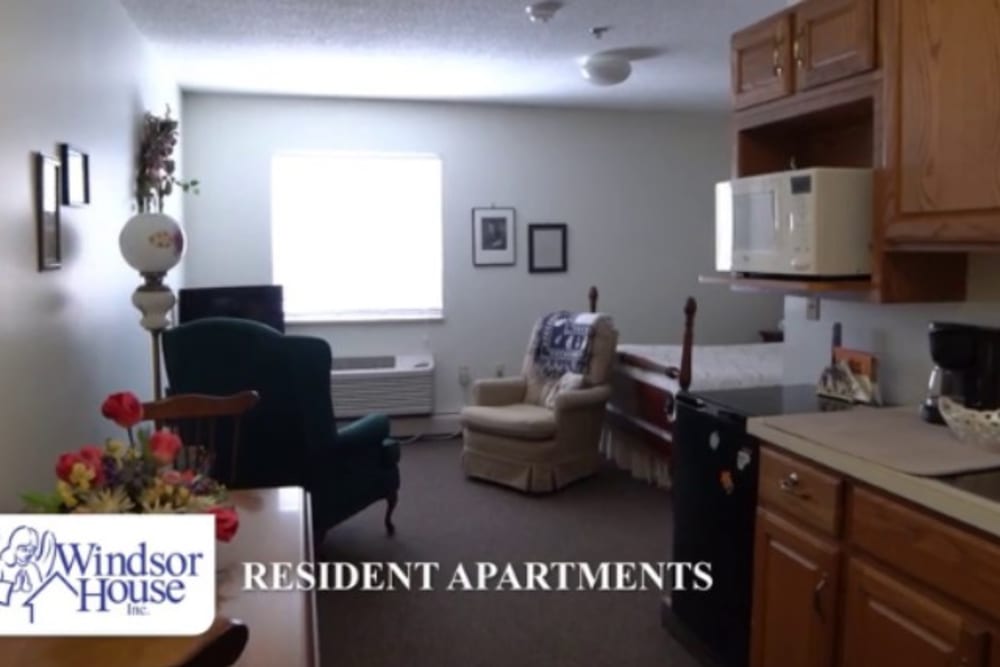 Kitchen and living area at Omni West Assisted Living in Youngstown, Ohio