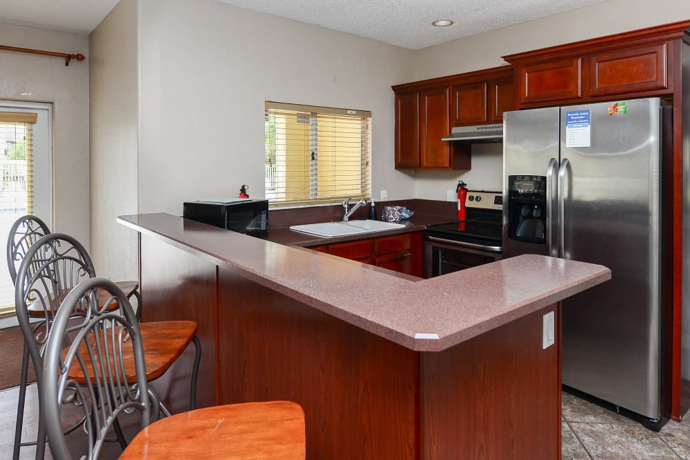 Kitchen in a home at Pointe Sienna Apartment Homes in Jacksonville, Florida