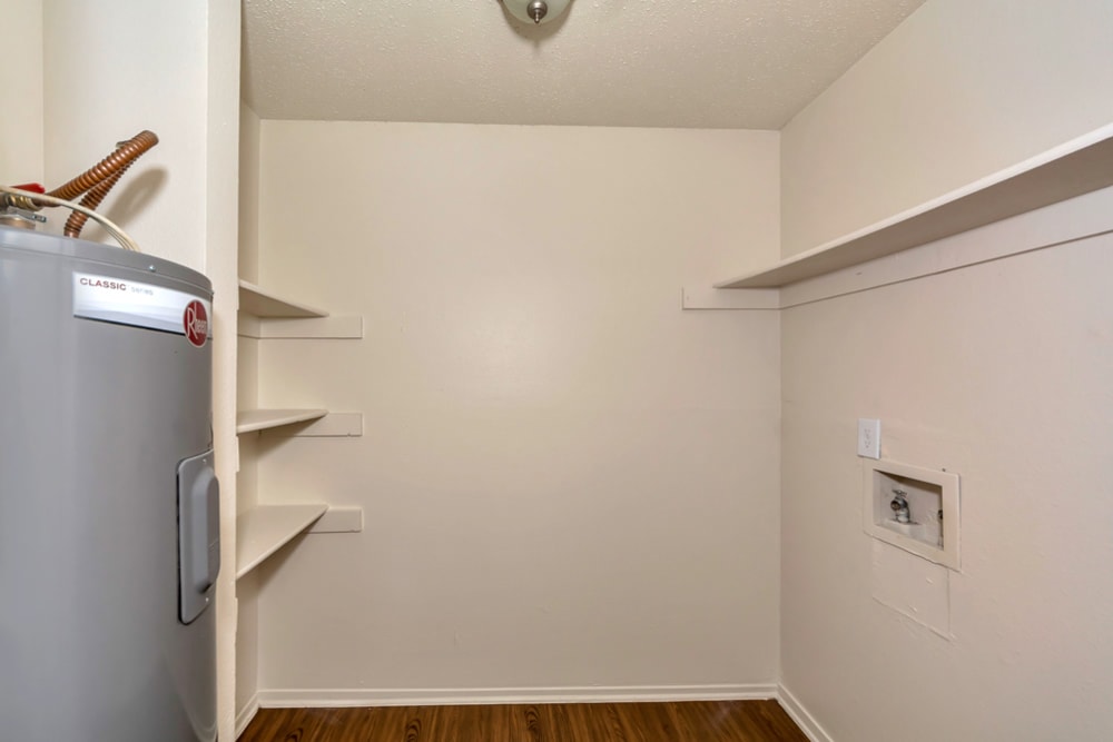 Laundry room area at Stonegate Apartments in Mckinney, Texas