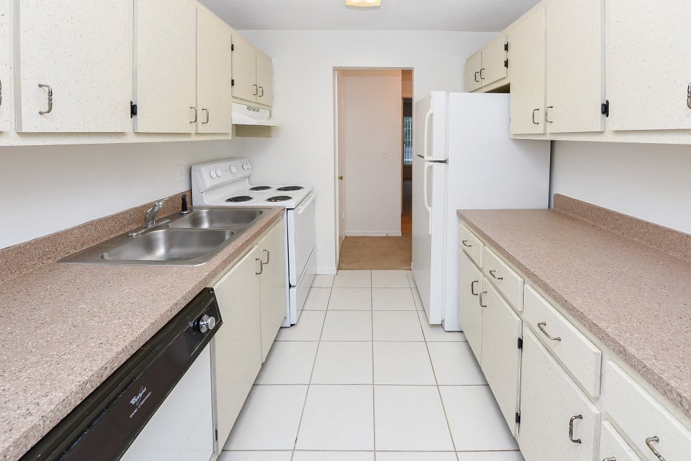 Kitchen with white appliance at Reserve at Lake Pointe Apartments & Townhomes in St Petersburg, Florida