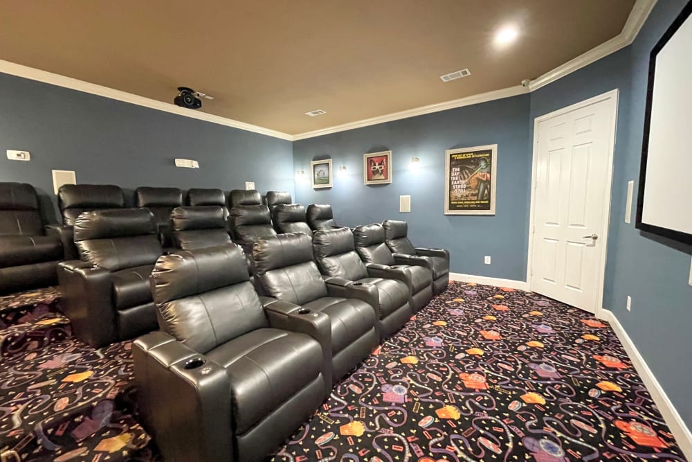 Enjoy apartments with a resident movie theater room at The Abbey at Briar Forest in Houston, Texas