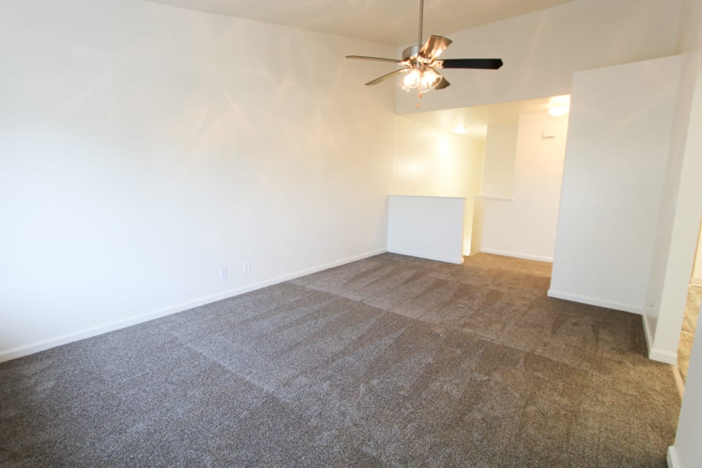 Carpeted room with ceiling fan in a home at Bayview Hills in San Diego, California