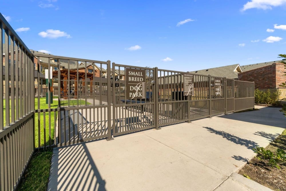 Separate small and large breed offleash dog parks at Auberge of Burleson in Burleson, Texas