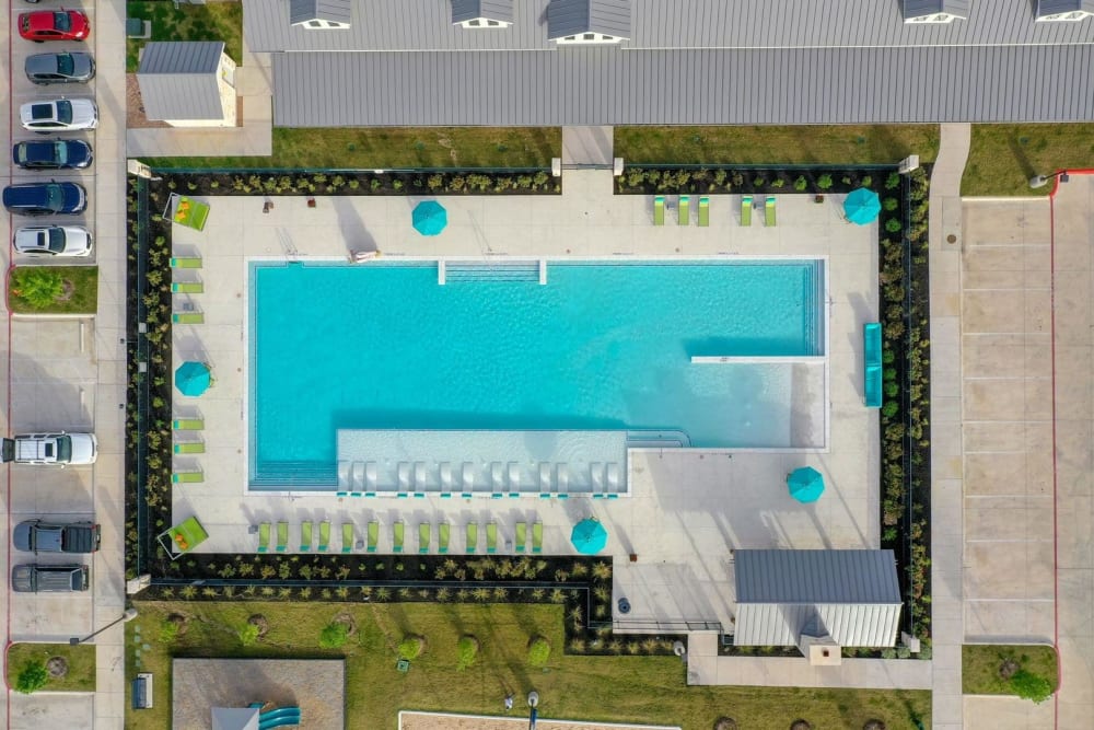 Aerial view of the sparkling resort style pool at Biltmore at the Park in Pflugerville, Texas