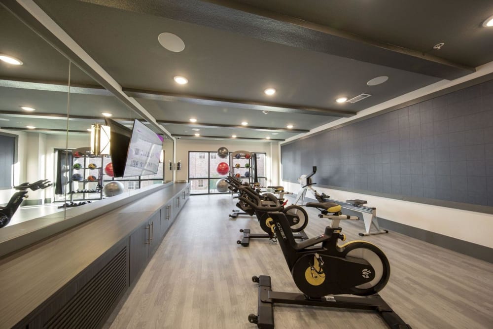 Interactive yoga studio with stationary bikes and a rowing machine at Steelyard in Oklahoma City, Oklahoma