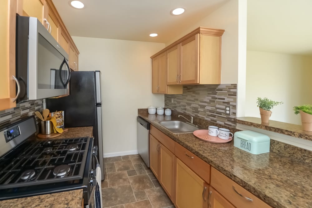 Kitchen at Hill Brook Place Apartments in Bensalem, Pennsylvania