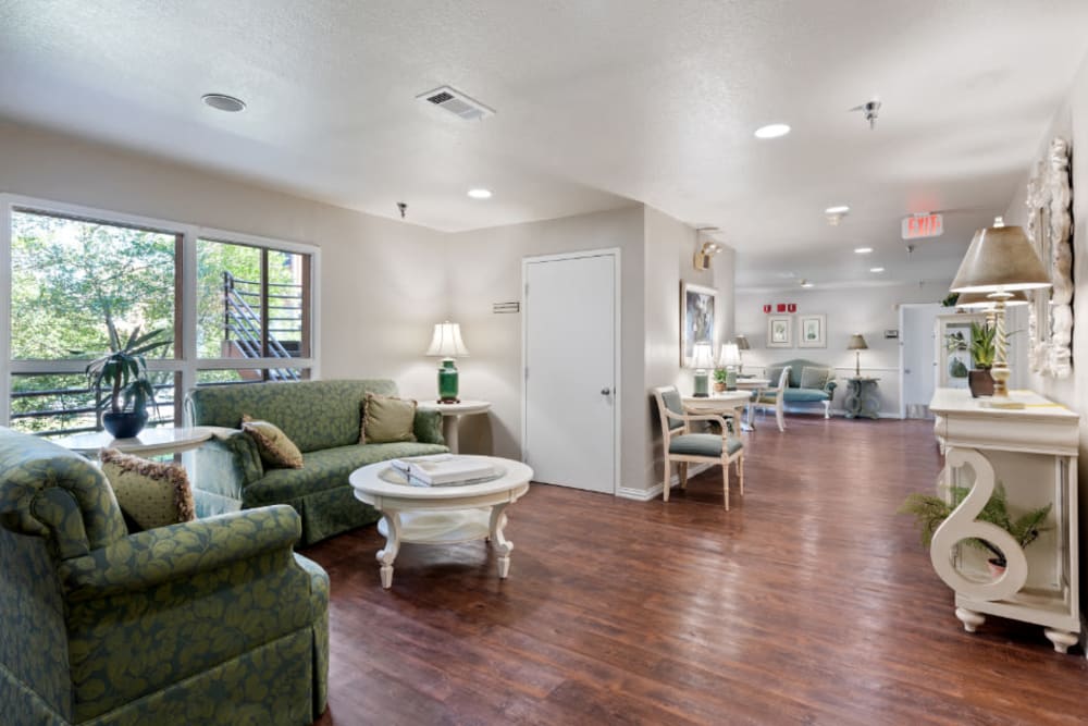 living room with wood style floors at Truewood by Merrill, River Park in Fort Worth, Texas