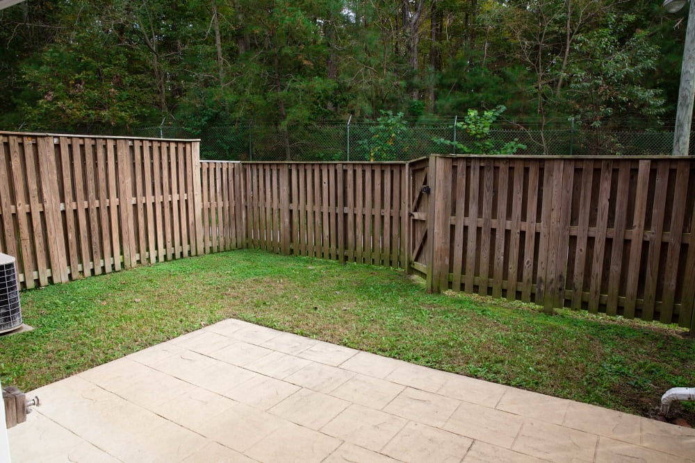 A fenced backyard with a patio at Glenn Forest in Lexington Park, Maryland