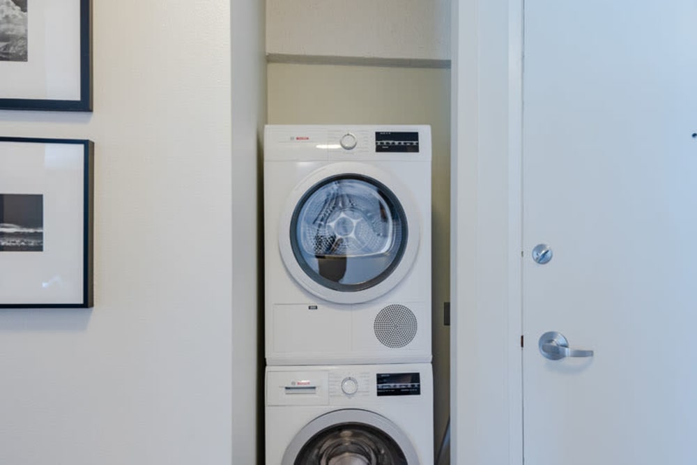 In-unit washer and dryer in a model apartment home at Tower 801 in Seattle, Washington