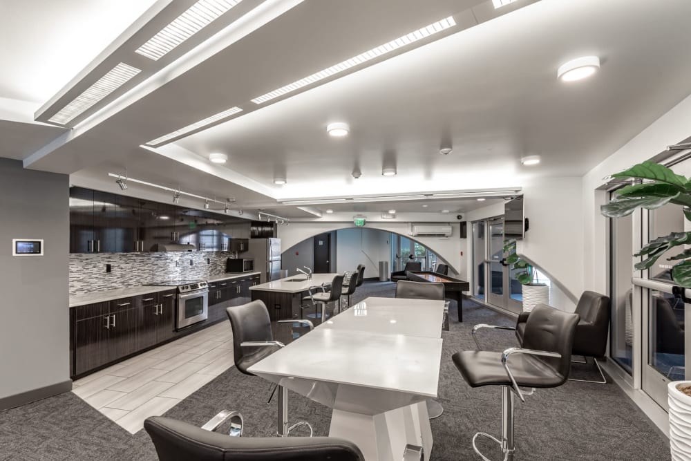 Clubhouse lounge with a demonstration kitchen at Tower 801 in Seattle, Washington