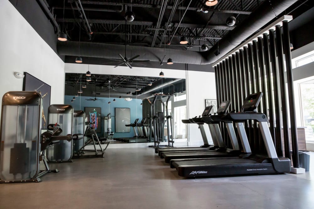 Modern fitness center at The Flats at West Broad Village in Glen Allen, Virginia