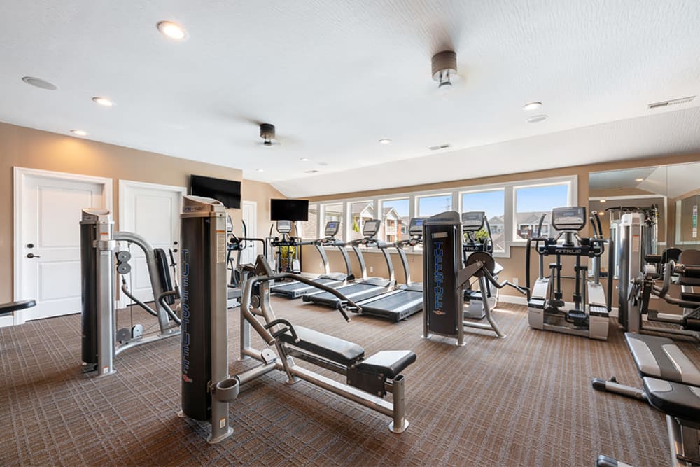 Fully-equipped fitness center for residents at Clifton Park Apartment Homes in New Albany, Ohio