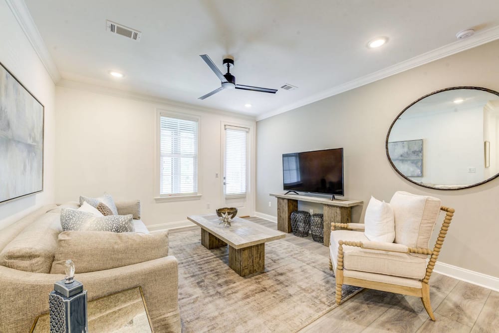 Spacious living room with ceiling fan at The Residences at 393 North in Santa Rosa Beach, Florida