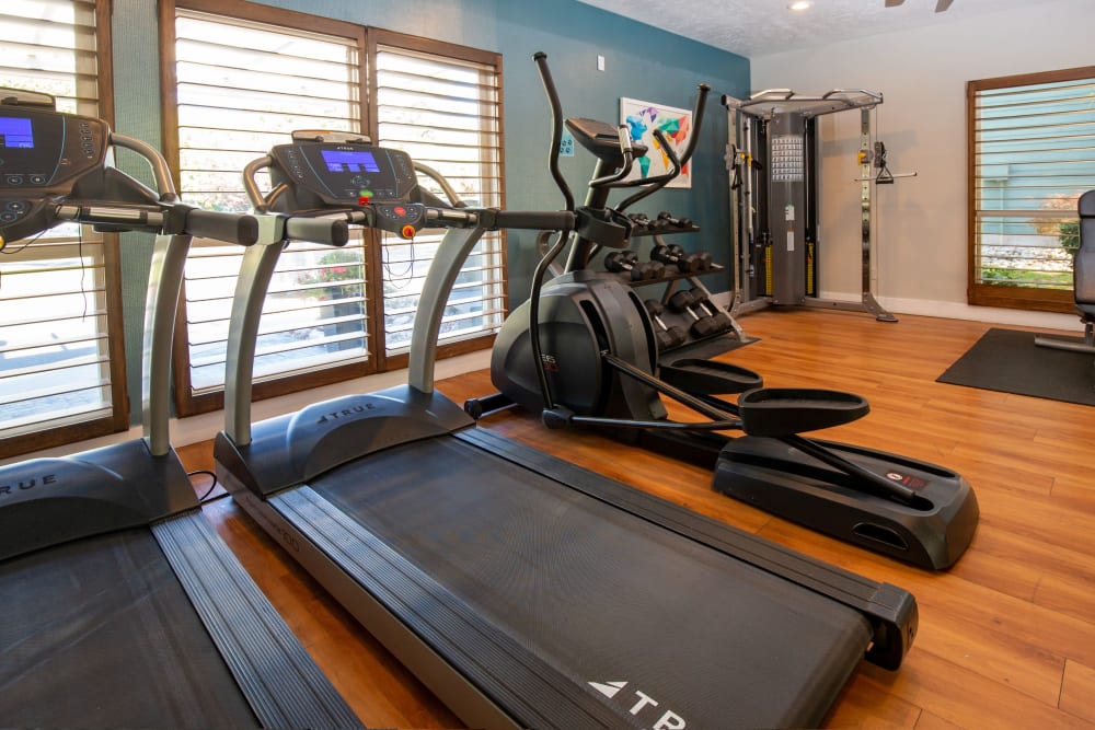 Fitness center with plenty of individual workout stations at Royal Ridge Apartments in Midvale, Utah