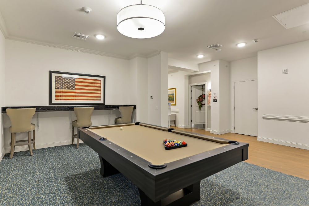 Community room with pool table at The Blake at Biloxi in Biloxi, Mississippi