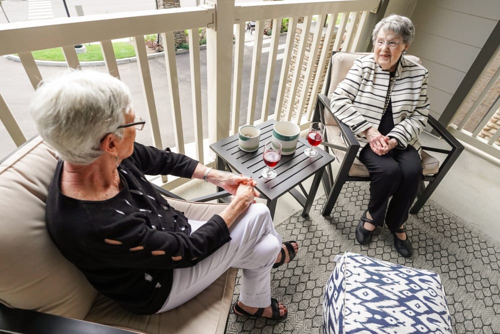 Residents on balcony Harmony at Bellevue in Nashville, Tennessee