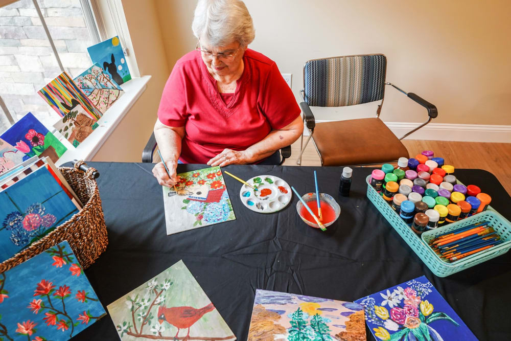 Resident doing crafts Harmony at Brentwood in Brentwood, Tennessee