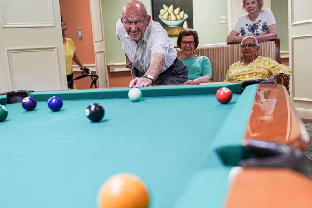 Residents playing pool Harmony at Falls Run in Fredericksburg, Virginia