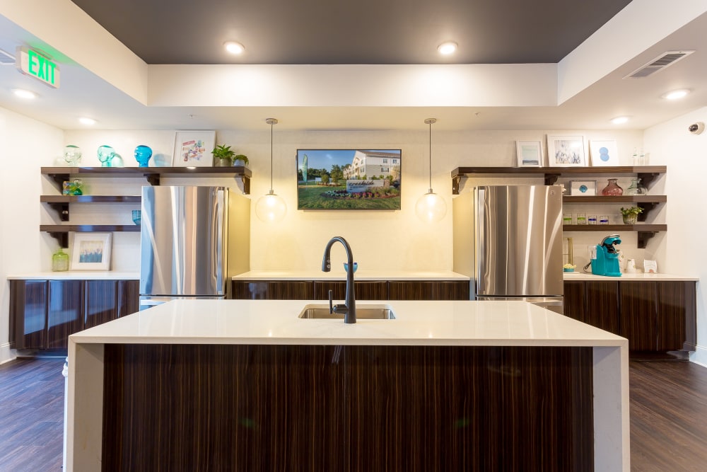 Kitchen with coffee station in the clubhouse at Creekside at Greenlawn Apartment Homes in Columbia, South Carolina
