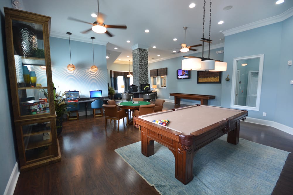 Clubhouse with pool table and business center at Estates at McDonough Apartment Homes in McDonough, Georgia