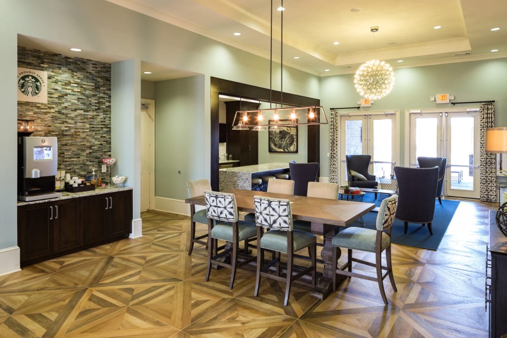 Beautiful modern clubhouse with coffee bar at Haywood Reserve Apartment Homes in Greenville, South Carolina