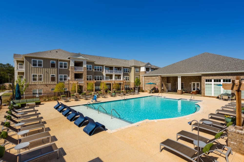 Resort-style pool with sundeck at Haywood Reserve Apartment Homes in Greenville, South Carolina