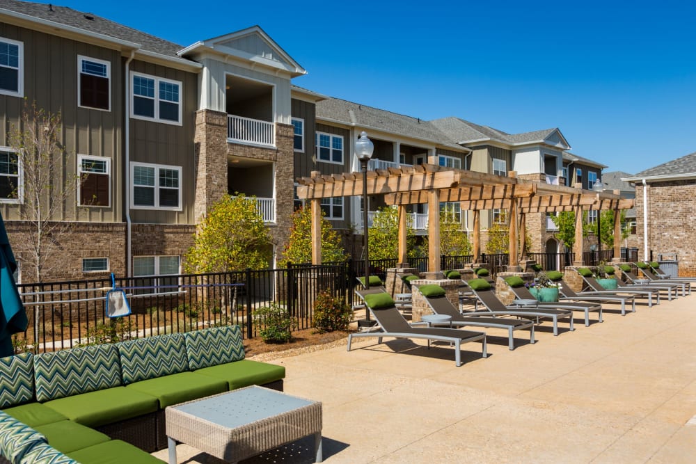 Poolside lounge seating at Haywood Reserve Apartment Homes in Greenville, South Carolina