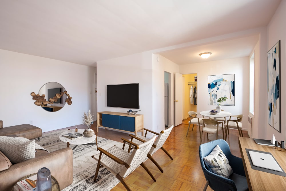 Spacious and well lit living room in a model home at Eastgold Long Island in Long Beach, New York