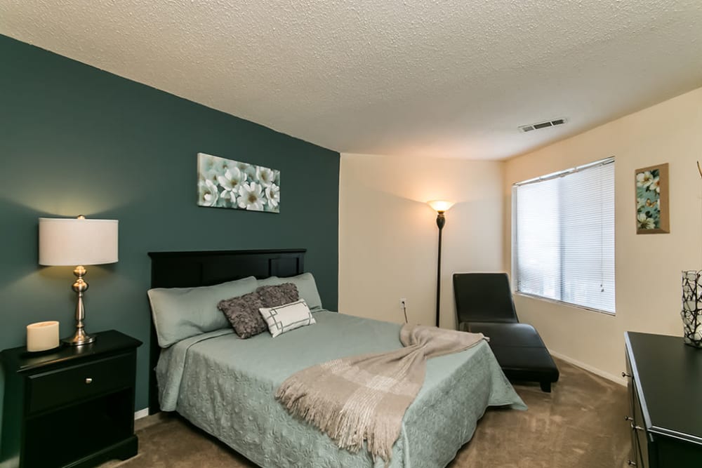 Spacious model bedroom with plush carpeting at Gable Hill Apartment Homes in Columbia, South Carolina