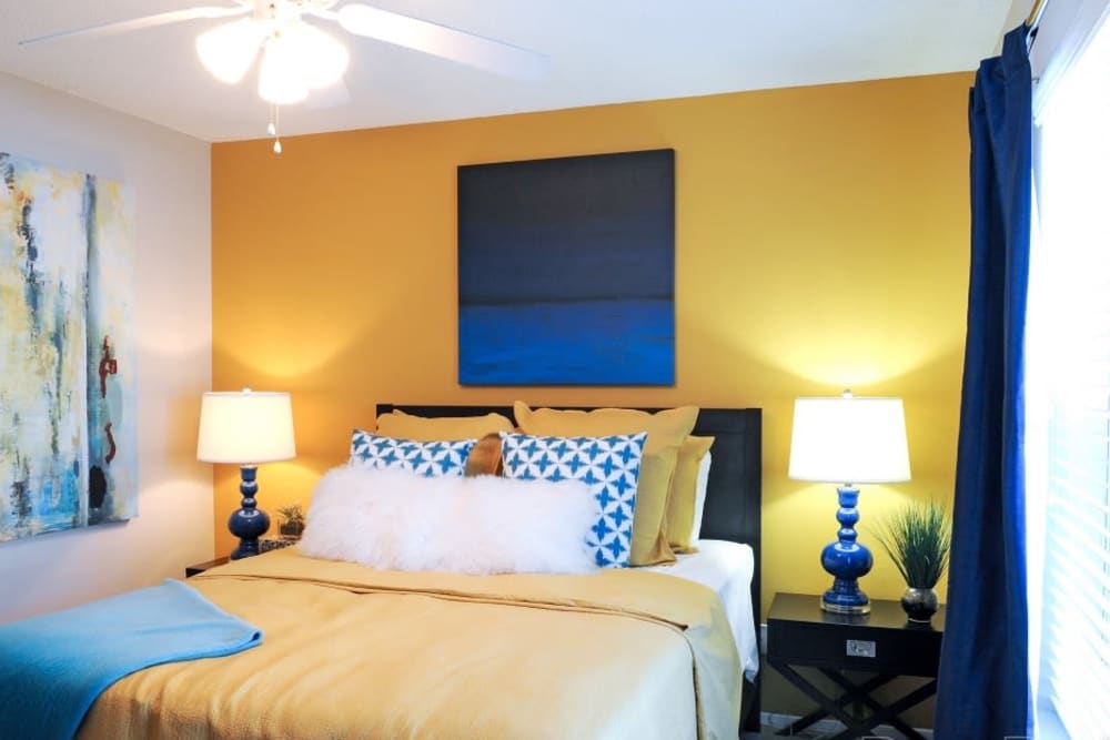 Bright model bedroom at Hampton Greene Apartment Homes in Columbia, South Carolina