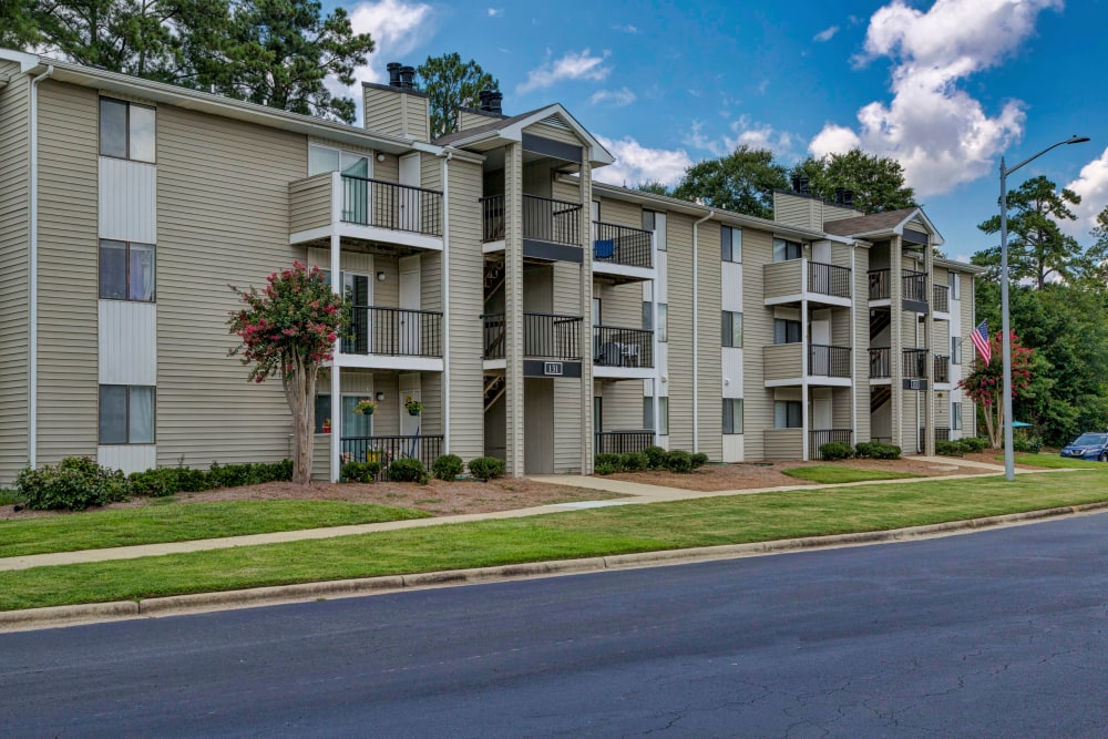 Building exterior with private balconies at Morganton Place Apartment Homes in Fayetteville, North Carolina