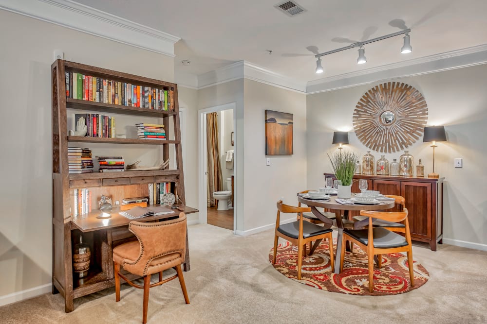 Dining area and office space at Oasis at Montclair Apartments in Dumfries , VA