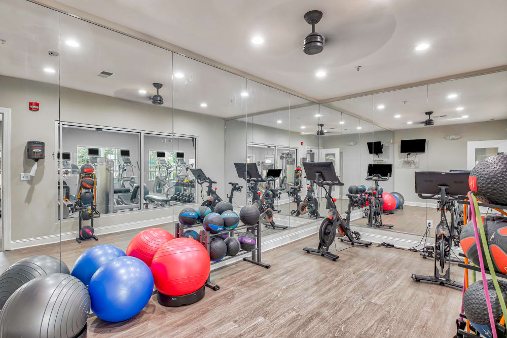 Fitness Center with peloton bikes at Oasis at Montclair Apartments in Dumfries, Virginia