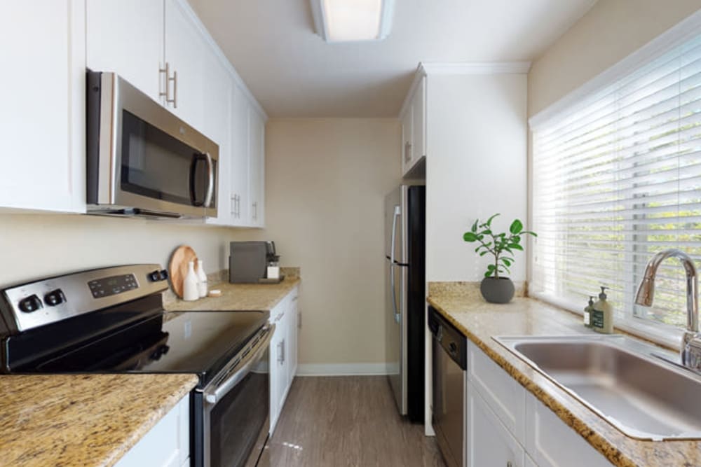 Two-bedroom apartment's kitchen at Valley Plaza Villages in Pleasanton, California