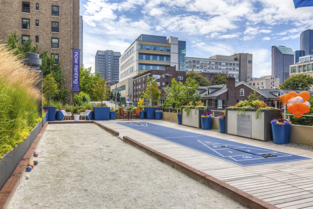 Shuffleboard and bocce ball area at Panorama Apartments in Seattle, Washington