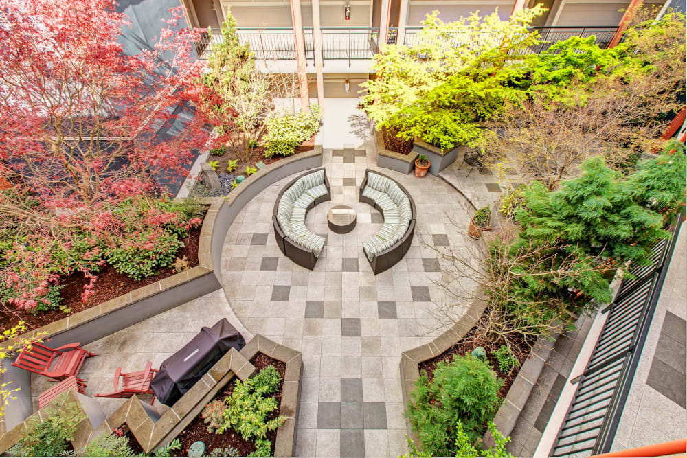View of a lush interior open-air courtyard from an upper floor at 700 Broadway in Seattle, Washington