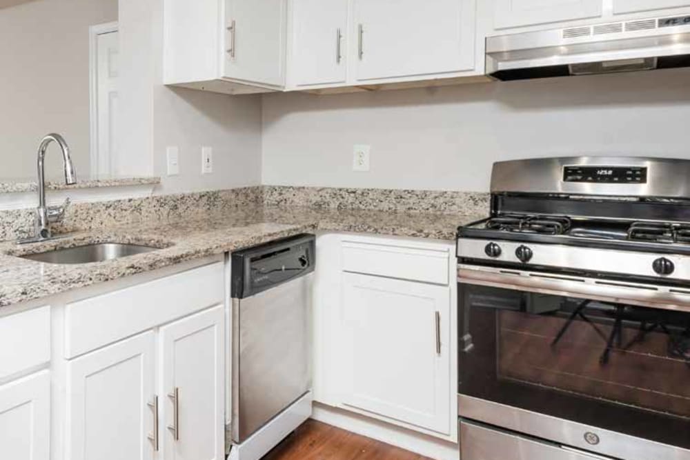Lots of space on the nice granite style counters in the kitchen at The Village of Churchills Choice in Upper Marlboro, Maryland
