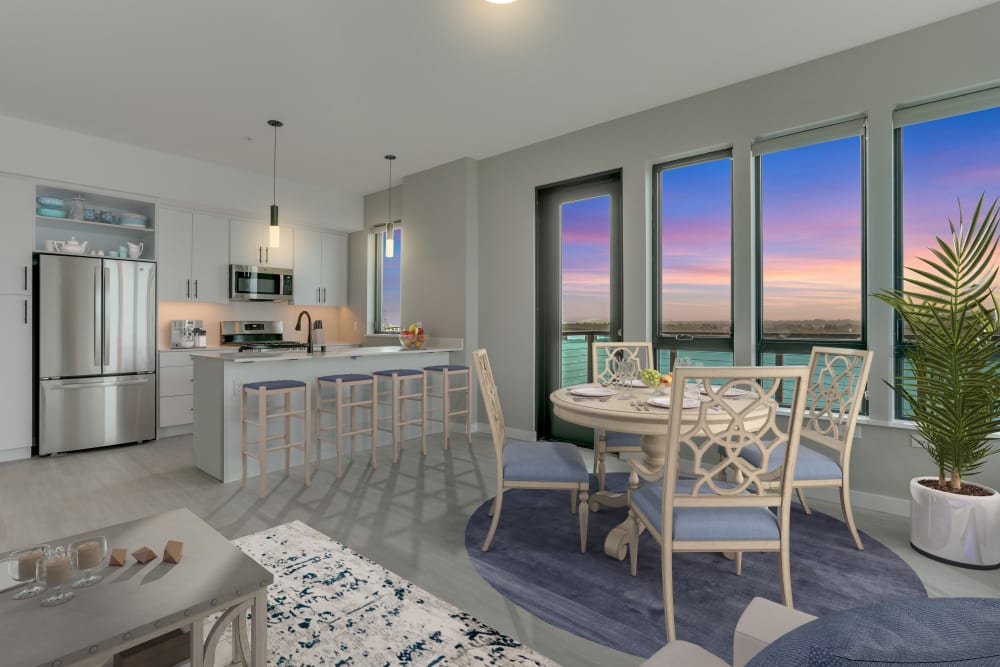 Dining area with view to kitchen at The Columbia at the Waterfront in Vancouver, Washington 