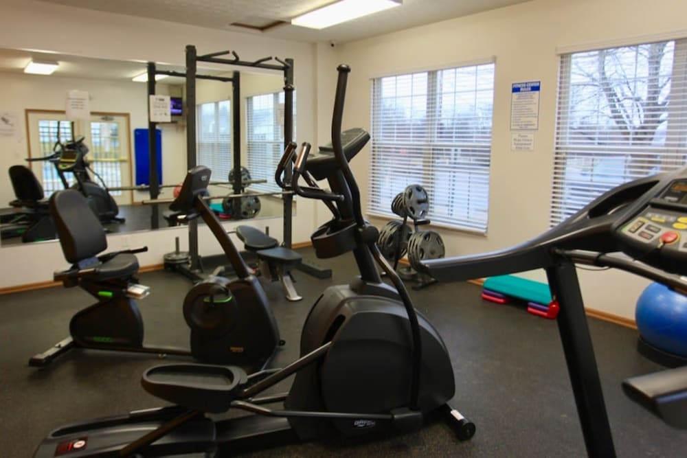 Fitness center with a variety of cardio equipment at Trotter's Landing in Delaware, Ohio