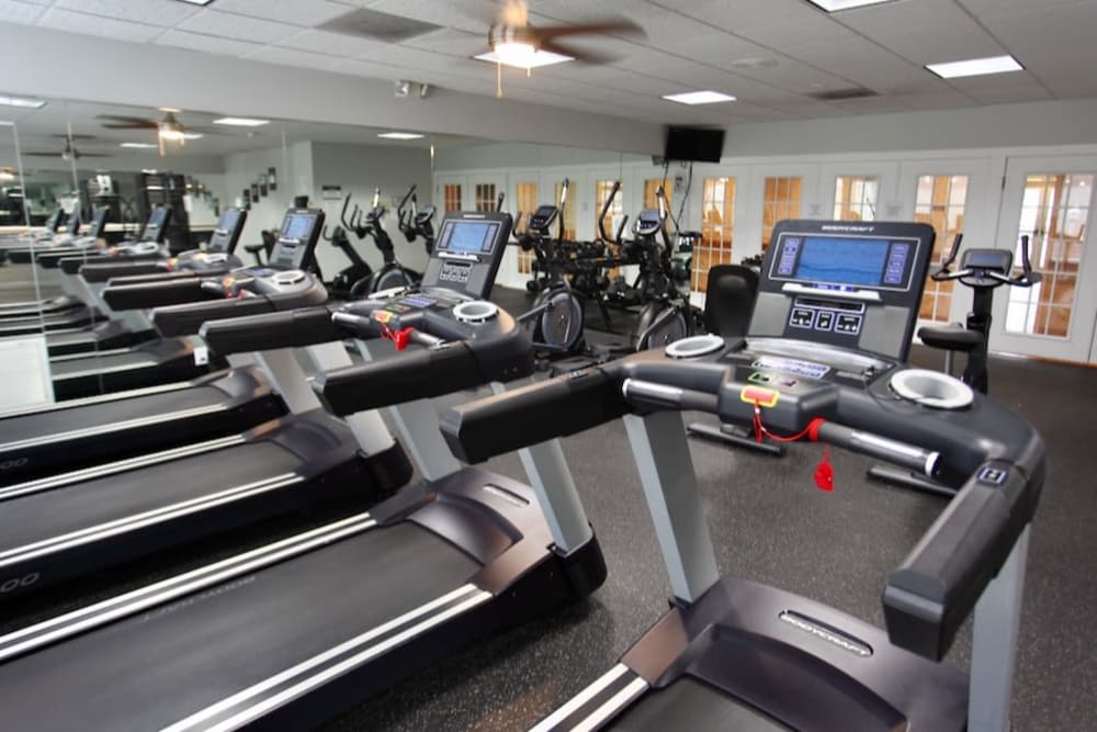 Fitness center with a variety of cardio equipment at The Canterbury in Columbus, Ohio