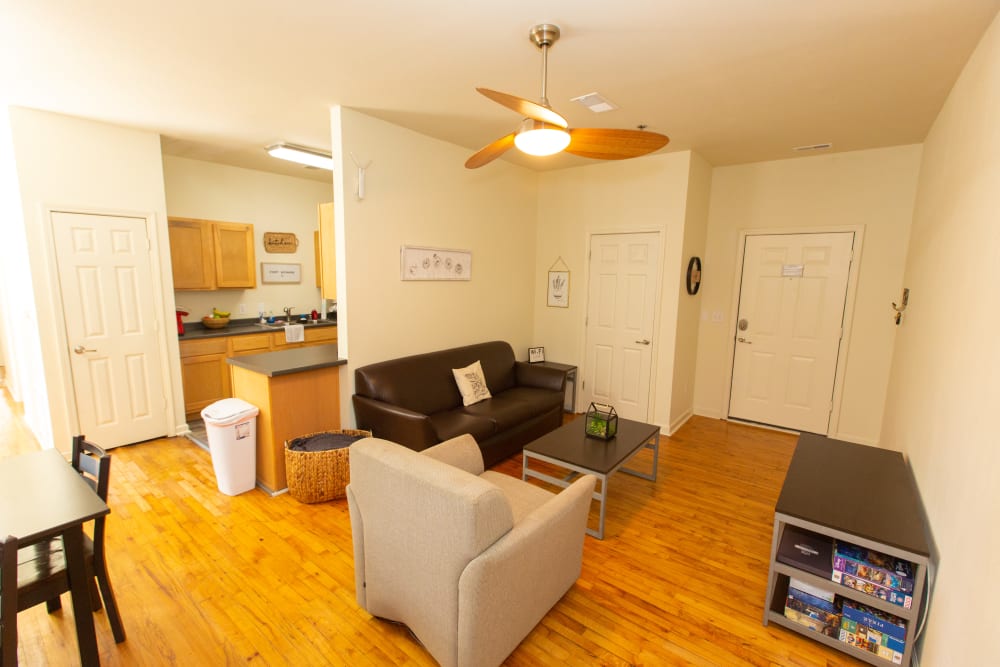 Spacious living room with wood flooring at Columns in Bowling Green, Kentucky