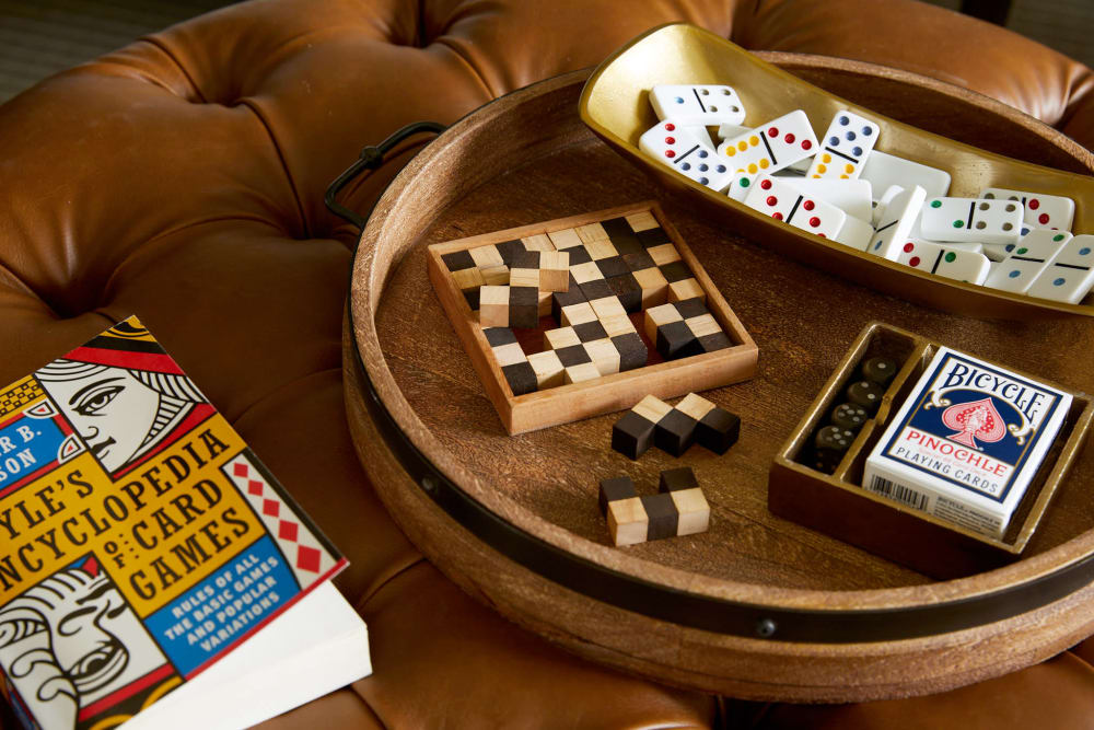 Games sitting on a coffee table at Amira Choice Forest Lake in Forest Lake, Minnesota