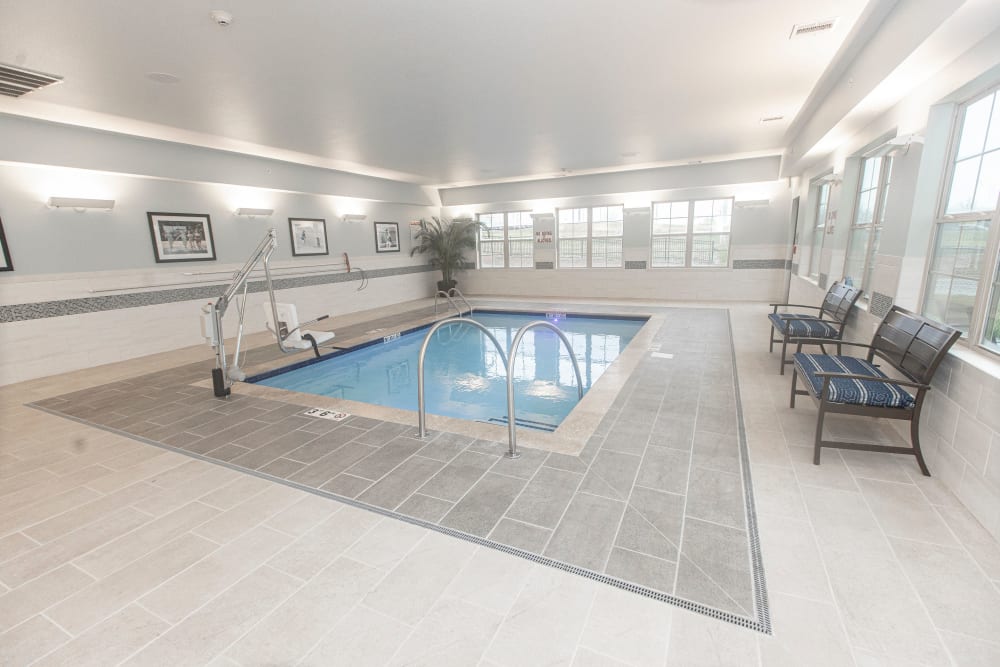 Pool with outdoor views at The Madison Senior Living in Kansas City, Missouri