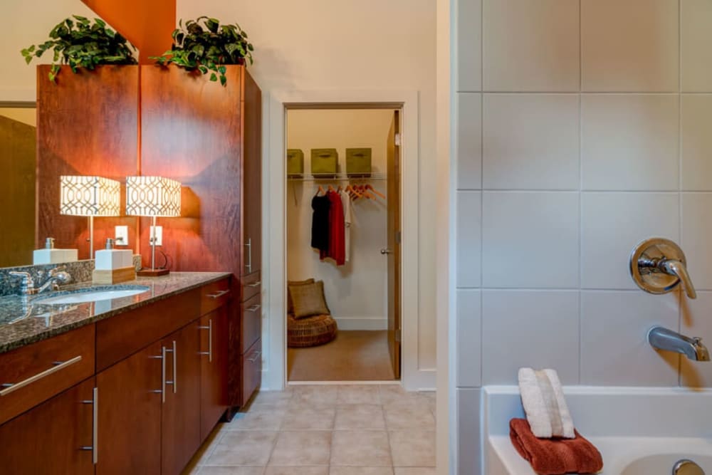 Model bathroom with generous storage at eon at Lindbergh in Atlanta, Georgia